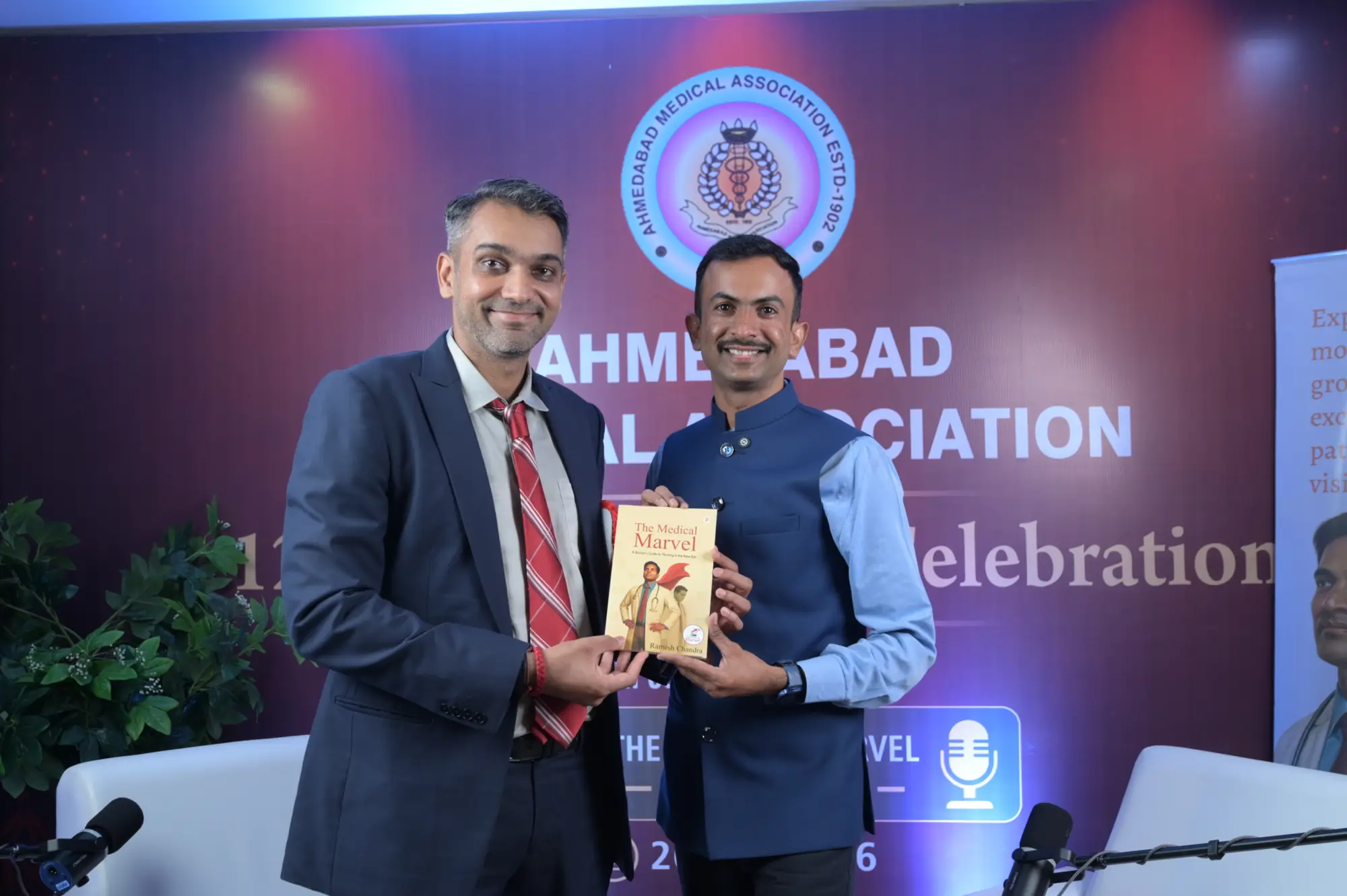 Ramesh Chandra presenting The Medical Marvel to a doctor at the Ahmedabad Medical Association annual day.